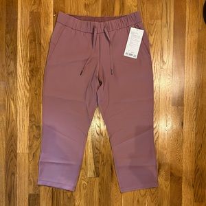 Lululemon “On The Fly” crop pants. “Red Dust” color, New with tags